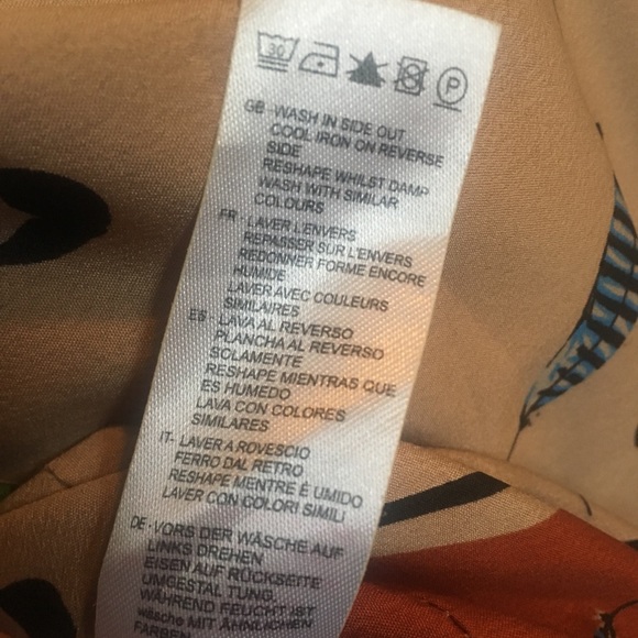 YUMI tan and brown feather print dress. - Picture 7 of 7